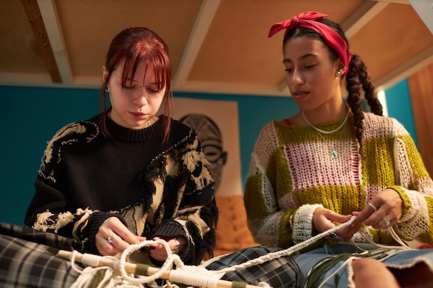 Portraits of two embroidery artists